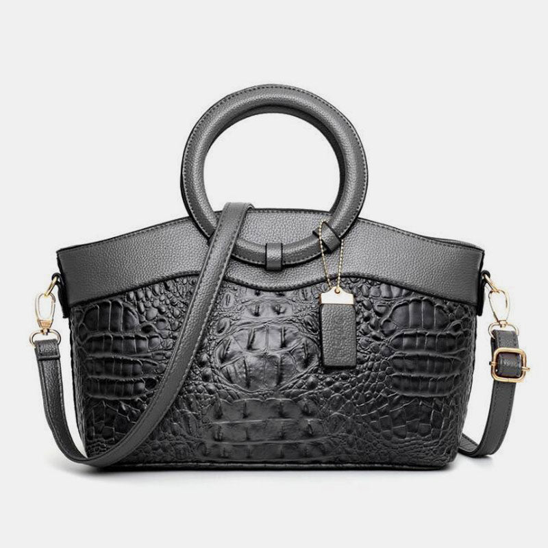 Umhängetasche mit großem Fassungsvermögen und Vintage-Prägung und Henkeltasche