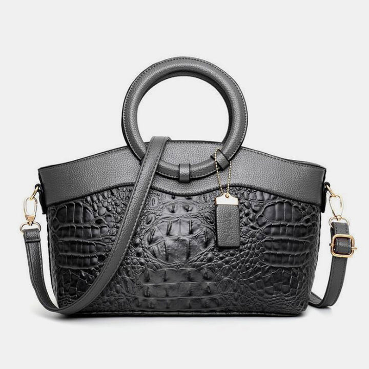 Umhängetasche mit großem Fassungsvermögen und Vintage-Prägung und Henkeltasche