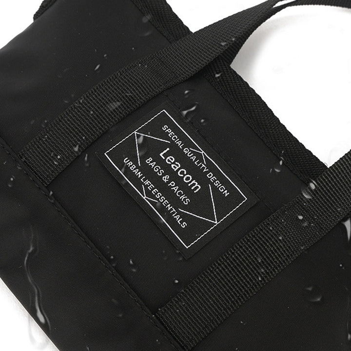 Kleine schwarze Retro-Umhängetasche für Unisex mit Henkel oben