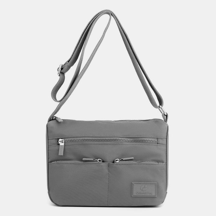 Leichte, wasserdichte Umhängetasche mit mehreren Taschen 