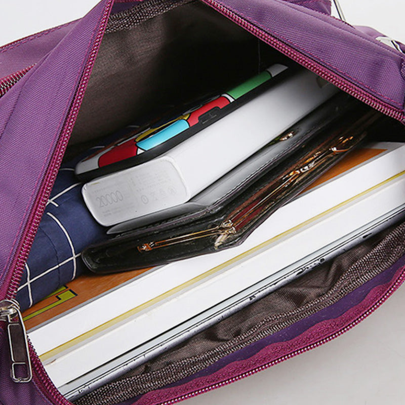 Wasserdichte Umhängetasche mit mehreren Taschen und Aufdruck