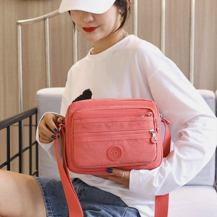 Lässige Umhängetasche mit mehreren Taschen und leichtem Design