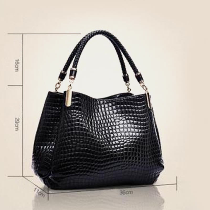 Minimalistische Damen-Tasche mit Henkel und Krokodilmuster aus veganem Leder