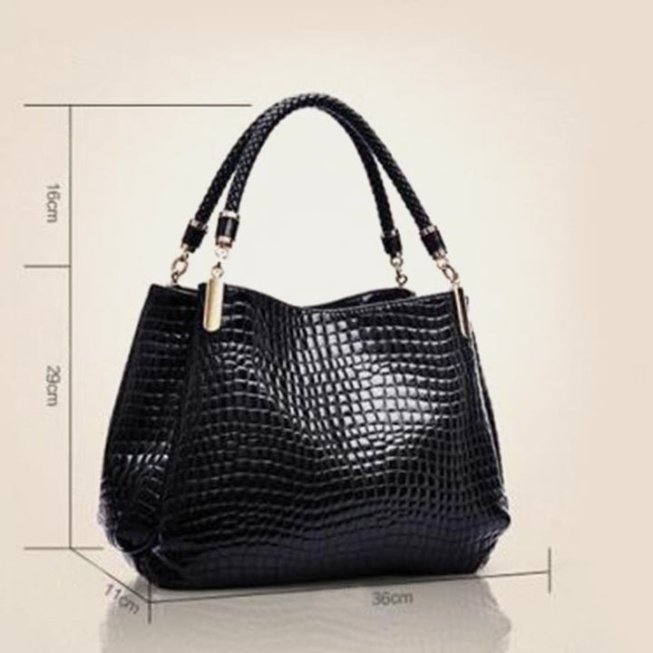 Minimalistische Damen-Tasche mit Henkel und Krokodilmuster aus veganem Leder