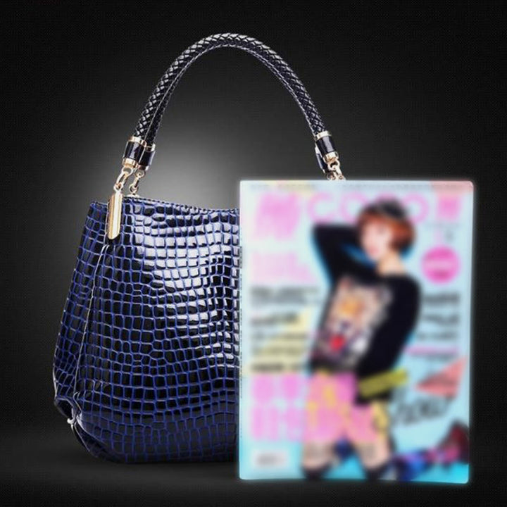 Minimalistische Damen-Tasche mit Henkel und Krokodilmuster aus veganem Leder