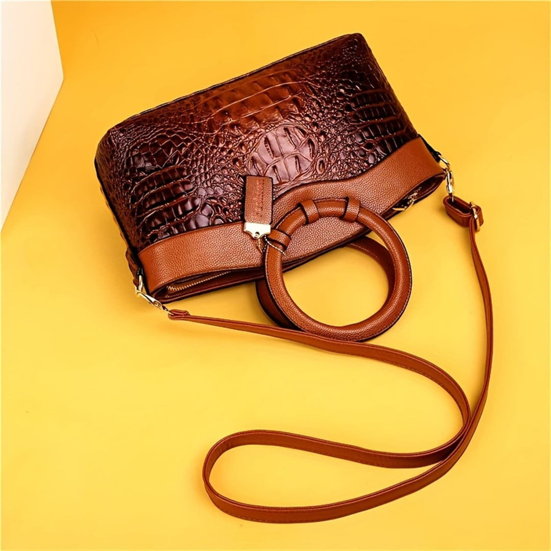 Umhängetasche mit großem Fassungsvermögen und Vintage-Prägung und Henkeltasche