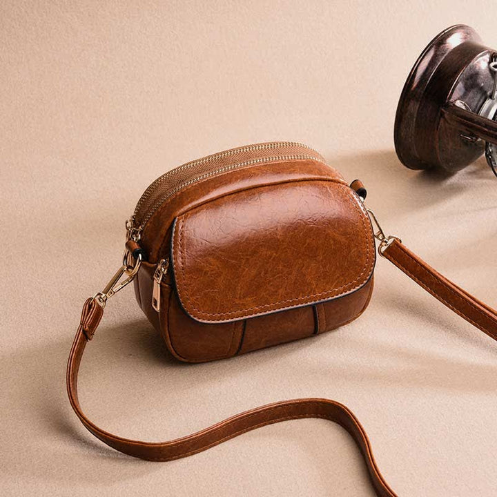 Kleine Umhängetasche aus Leder mit dreifachem Reißverschluss, Schultertasche für Damen