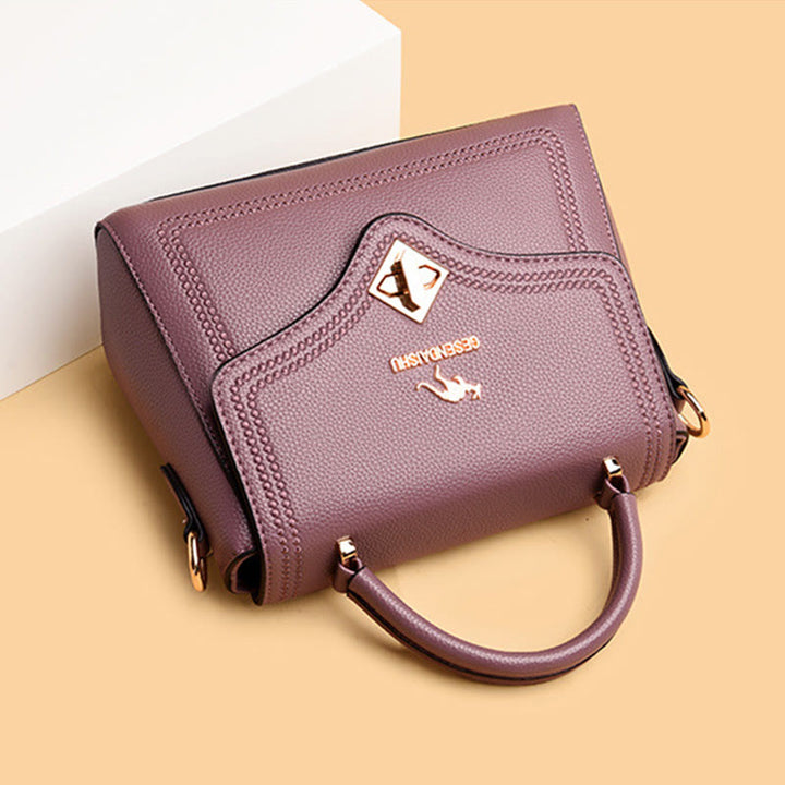 Klassische Tragetasche für den Weg zur Arbeit, minimalistische kleine Lederhandtasche