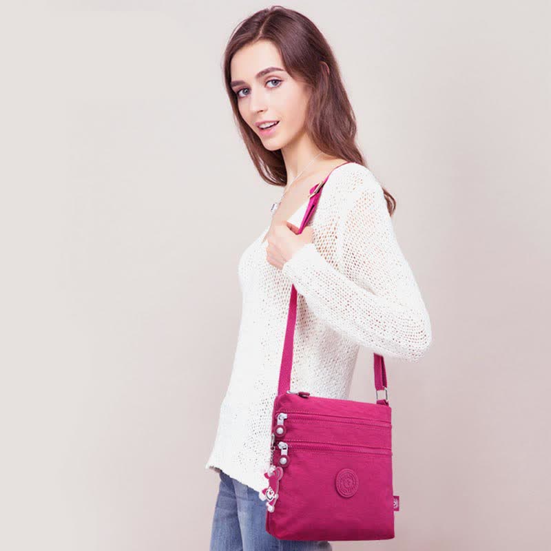 Leichte kleine Crossbody-Tasche mit Dreifach-Reißverschluss, Schultertasche für Damen