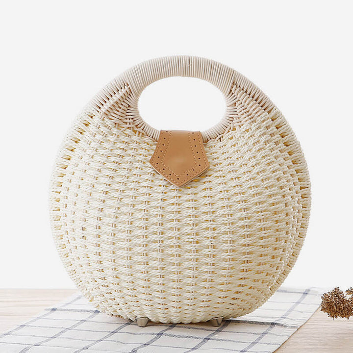 Lässige, runde Rattan-Handtasche