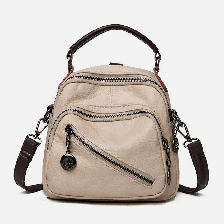 Multifunktionale, weiche Umhängetasche aus Kunstleder, umwandelbarer Rucksack - Blanchierte Mandeln - image 0