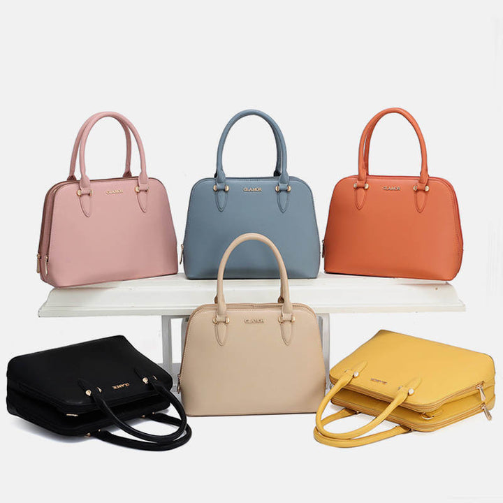 Solide Multi-Carry-Handtasche mit Muschel-Print