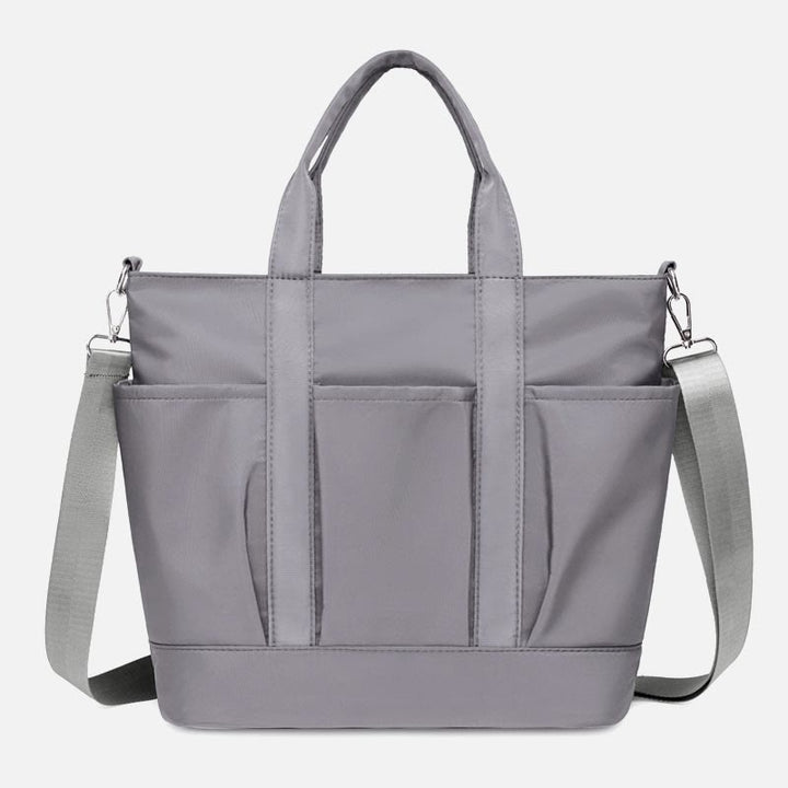Tragetasche für Damen, minimalistische, wasserdichte Umhängetasche aus Oxford-Gewebe in Lila
