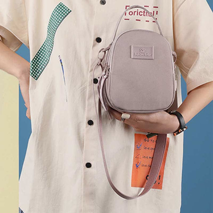 Umhängetasche mit dreifachem Reißverschluss für Damen, wasserdichte Mini-Reisehandtasche