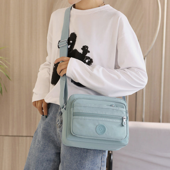 Lässige Umhängetasche mit mehreren Taschen und leichtem Design