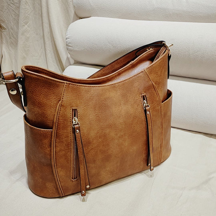 Elegante Umhängetasche für Damen mit Doppelreißverschluss und Quaste aus Leder