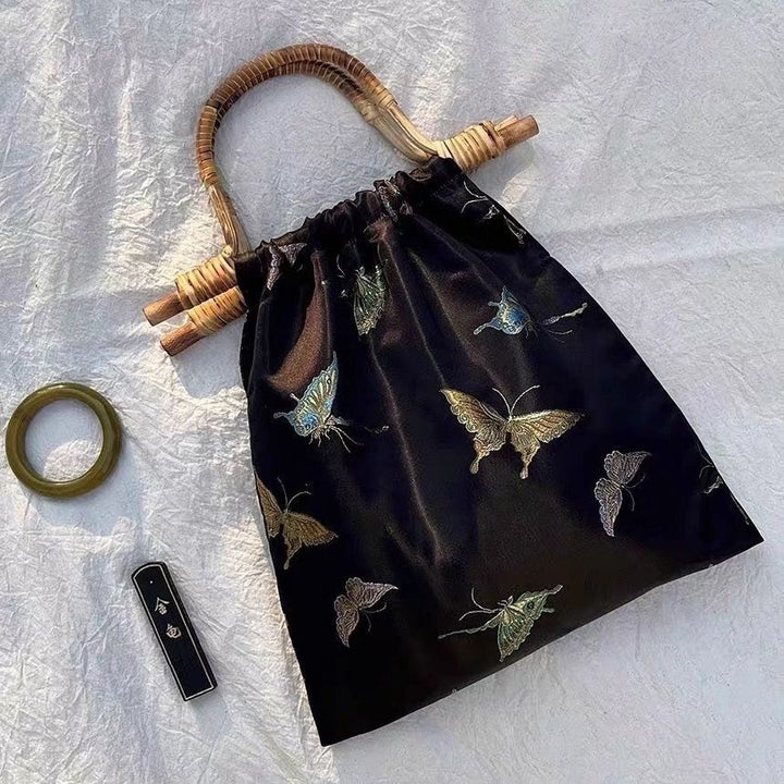 Schwarze und goldene Schmetterlingshandtasche für Damen, dicke Jacquard-Rattantasche