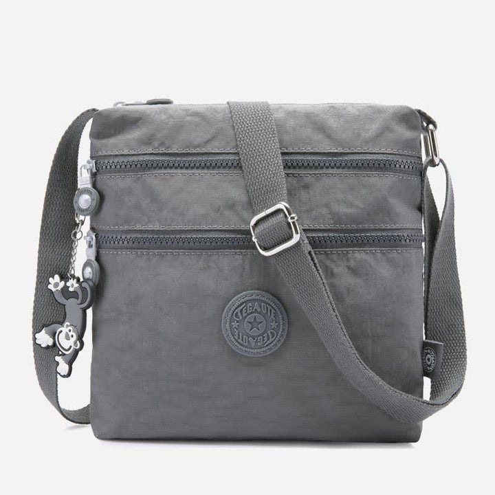 Leichte kleine Crossbody-Tasche mit Dreifach-Reißverschluss, Schultertasche für Damen