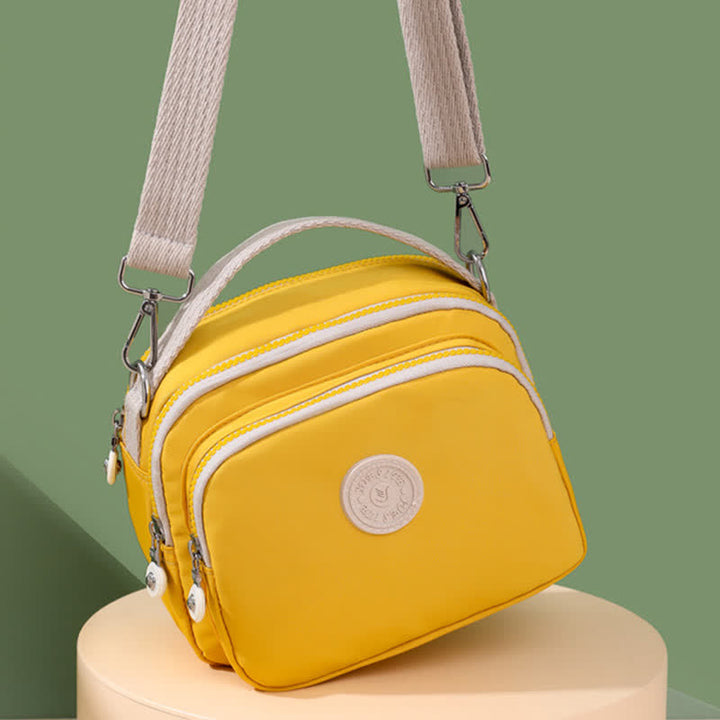 Kleine Handtasche mit dreifachem Reißverschluss für Damen, leichte, wasserdichte Umhängetasche