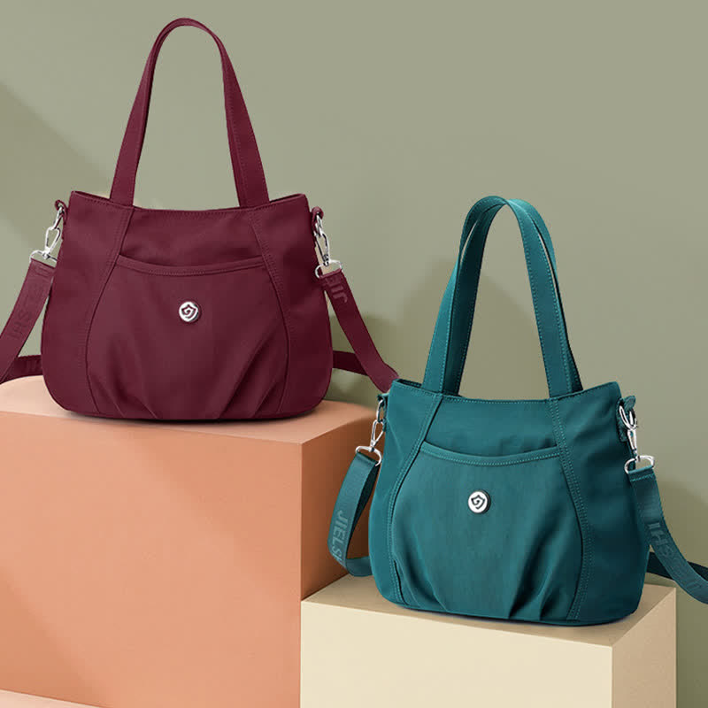 Leichte Umhängetasche aus Nylon mit mehreren Taschen und Reißverschlusstasche für Damen