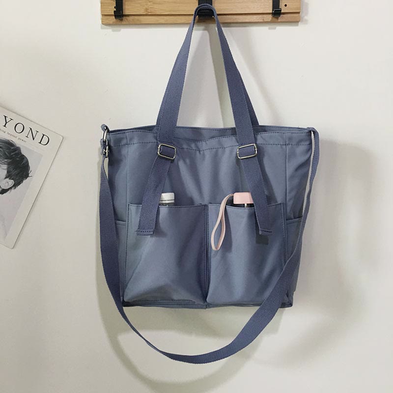 Große Tragetasche aus Canvas mit mehreren Taschen, funktionale Umhängetasche