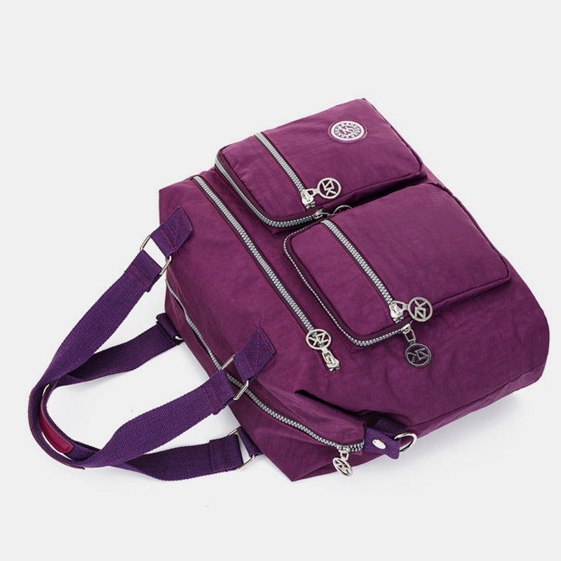 Wasserdichte Umhängetasche mit mehreren Taschen