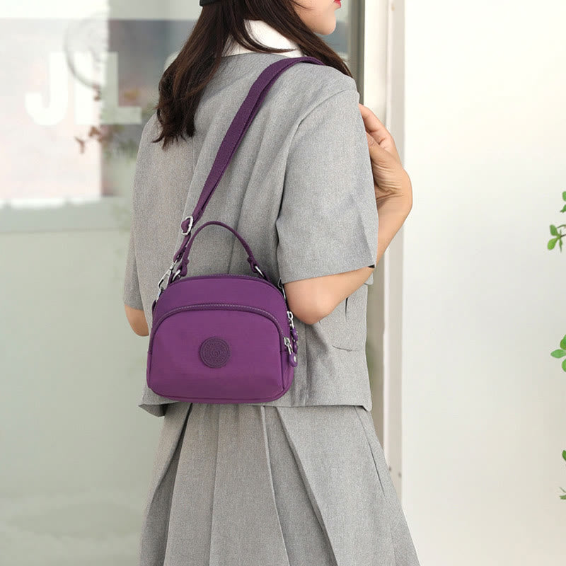 Leichte, wasserabweisende Handtasche für Damen mit mehreren Taschen