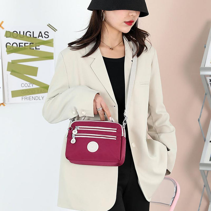 Leichte Handtasche aus Nylon mit mehreren Taschen, kleine Umhängetasche