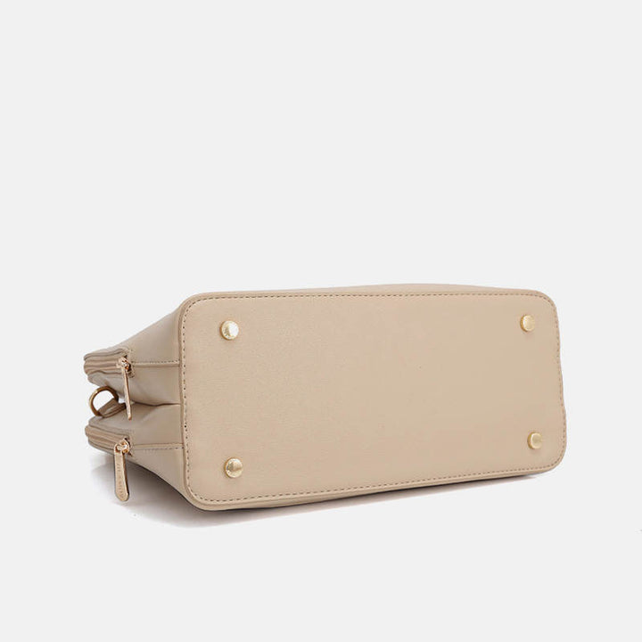 Solide Multi-Carry-Handtasche mit Muschel-Print