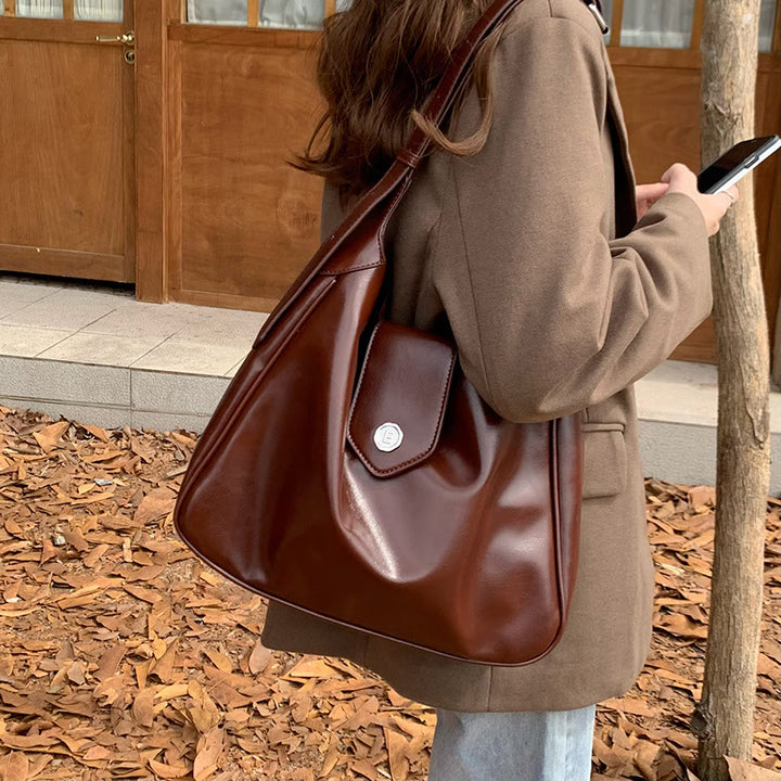 Minimalistische Ledertasche, einfarbig, breite Schnalle, Umhängetasche für Damen