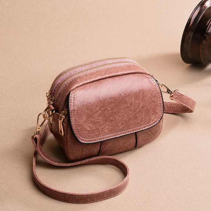 Kleine Umhängetasche aus Leder mit dreifachem Reißverschluss, Schultertasche für Damen
