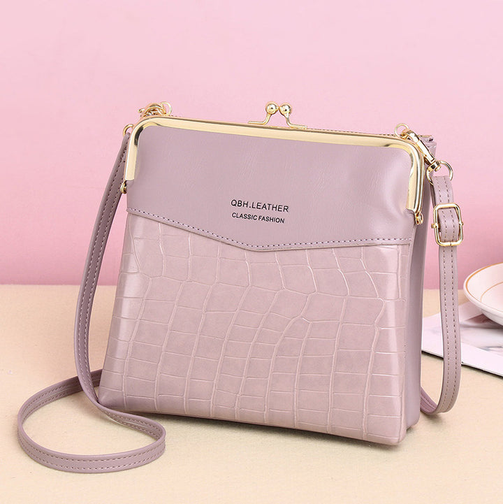 Leder-Crossbody-Handtasche für Damen mit zwei Fächern und Kiss Lock-Umhängetasche