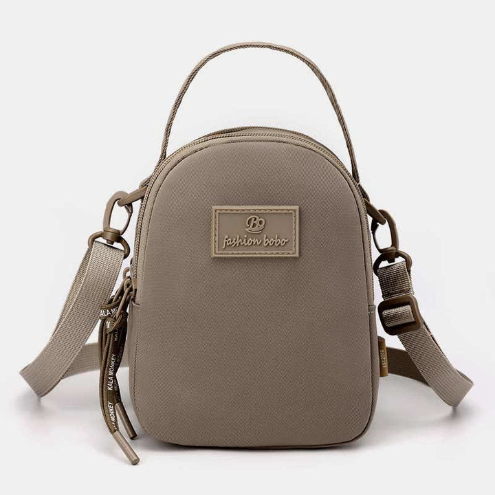 Umhängetasche mit dreifachem Reißverschluss für Damen, wasserdichte Mini-Reisehandtasche