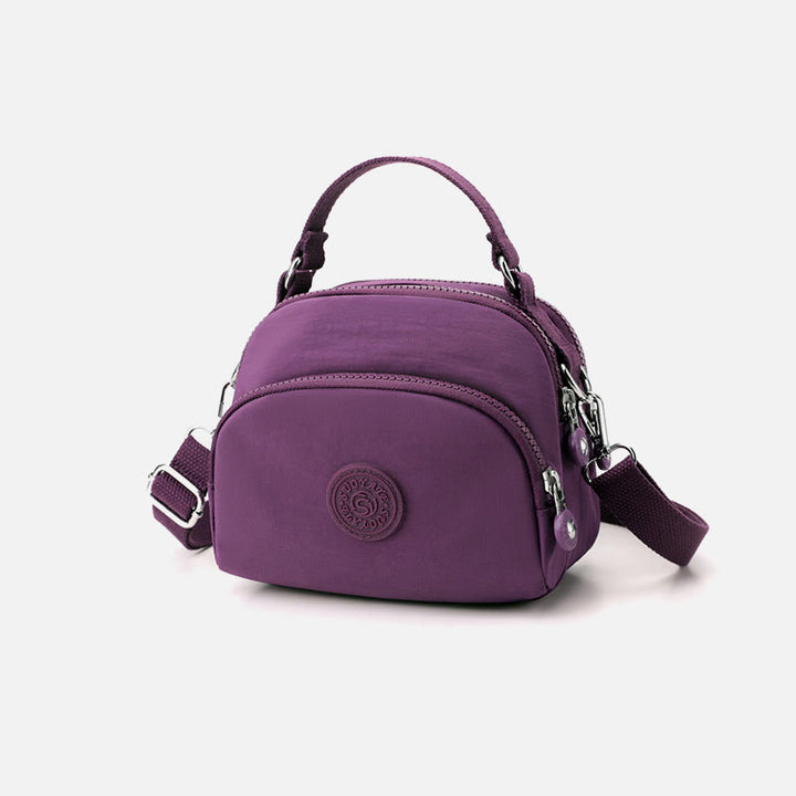 Leichte, wasserabweisende Handtasche für Damen mit mehreren Taschen