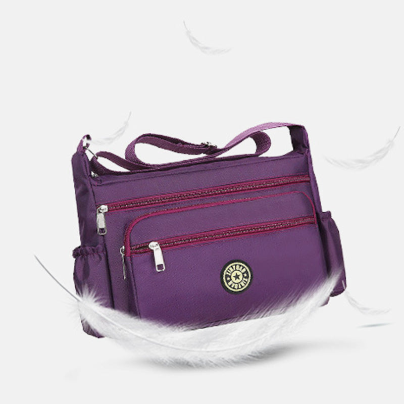 Wasserdichte Umhängetasche mit mehreren Taschen und Aufdruck