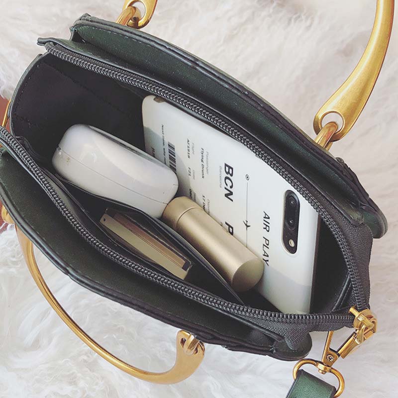 Elegante, runde Top-Grifftasche mit großem Fassungsvermögen und metallischem Griff