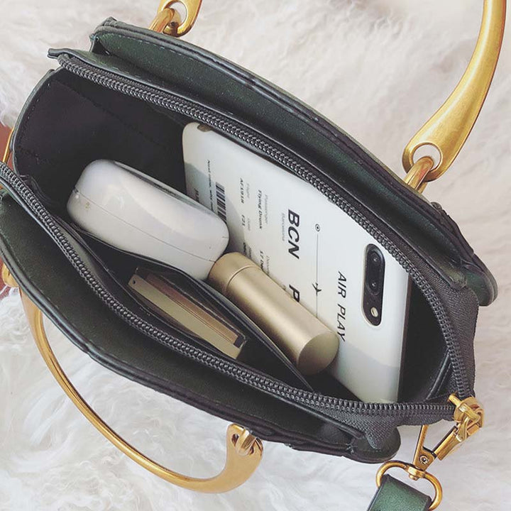 Elegante, runde Top-Grifftasche mit großem Fassungsvermögen und metallischem Griff
