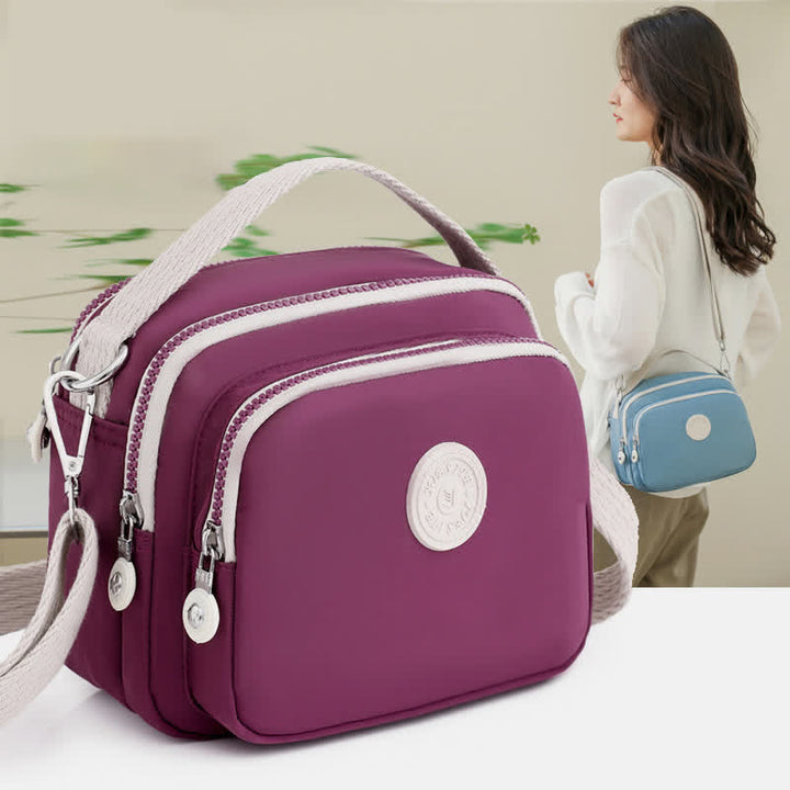 Kleine Handtasche mit dreifachem Reißverschluss für Damen, leichte, wasserdichte Umhängetasche