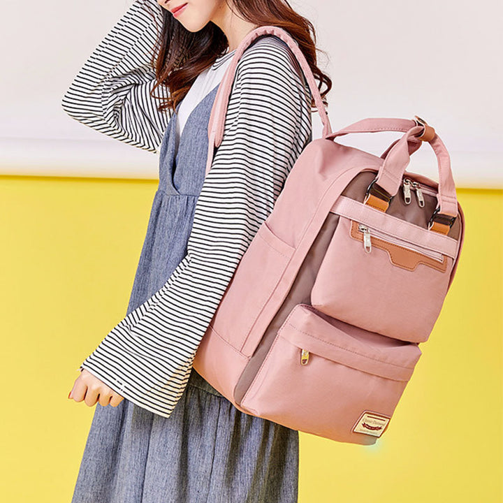 Modischer Patchwork-Rucksack mit Farbblockdesign und mehreren Taschen