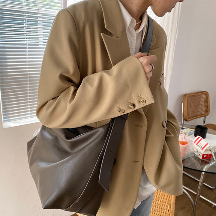 Damen Handtasche aus weichem Leder mit breiten Riemen, Vintage-Umhängetasche
