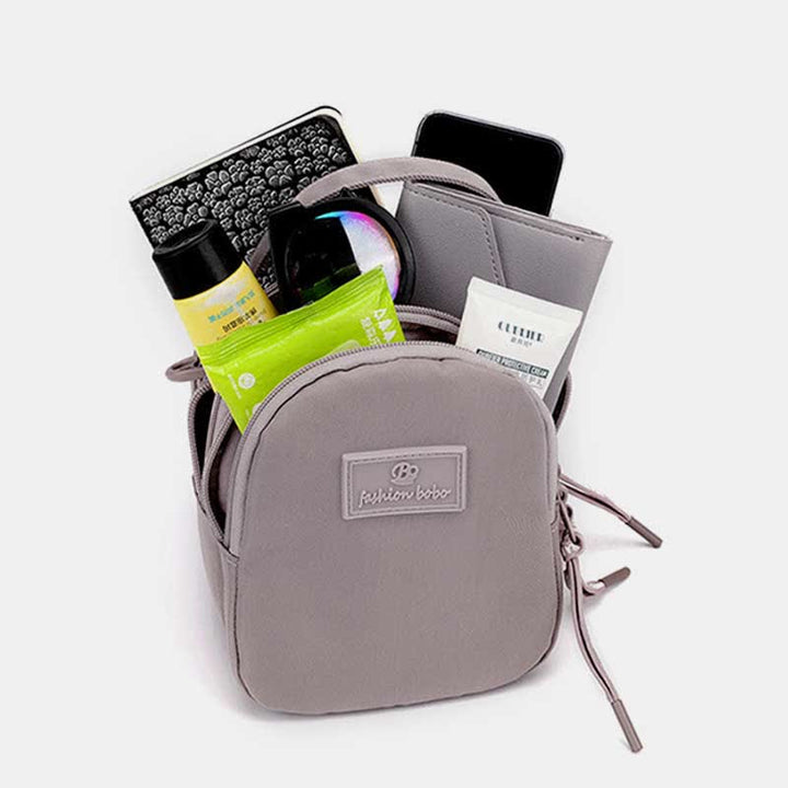 Umhängetasche mit dreifachem Reißverschluss für Damen, wasserdichte Mini-Reisehandtasche