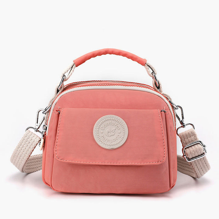 Tasche mit Griff oben für Damen, einfache, tragbare Umhängetasche mit Spritzschutz