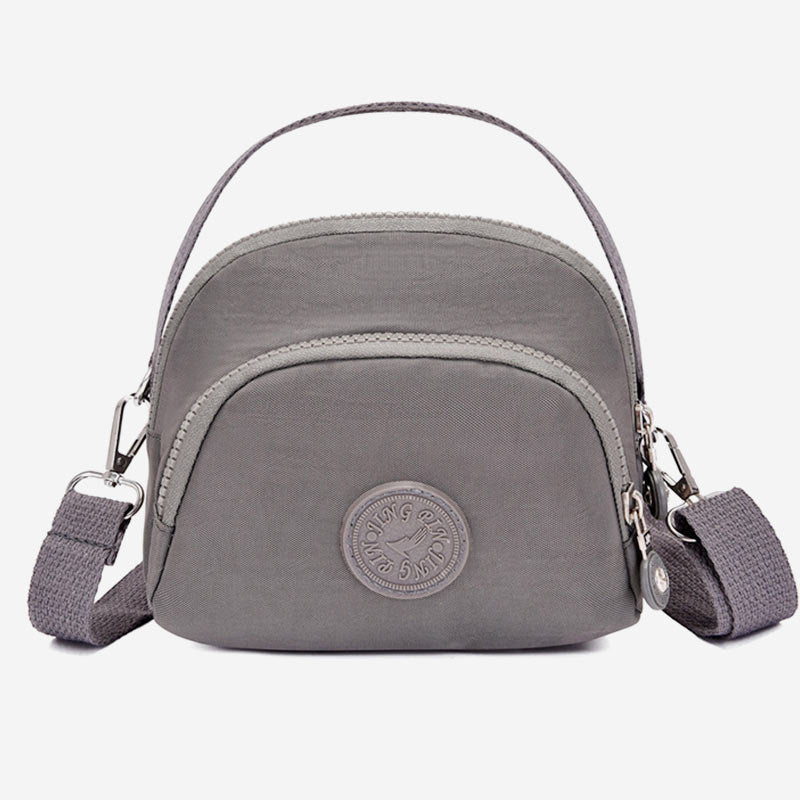Leichte, wasserabweisende Handtasche für Damen mit mehreren Taschen