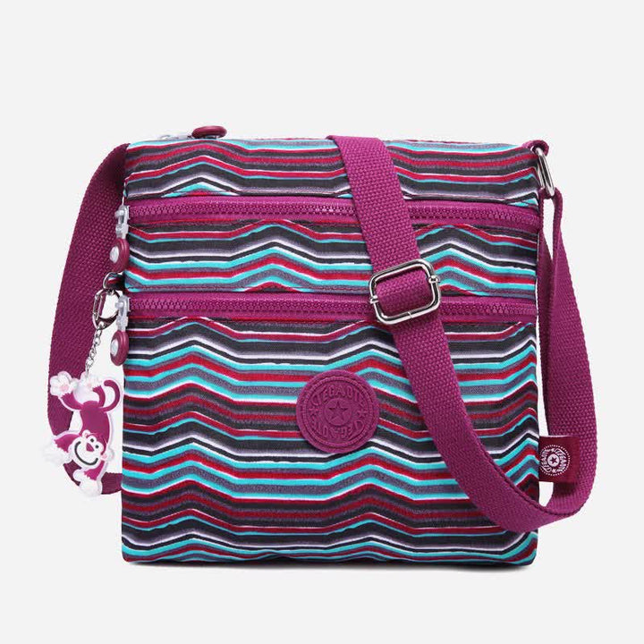 Leichte kleine Crossbody-Tasche mit Dreifach-Reißverschluss, Schultertasche für Damen