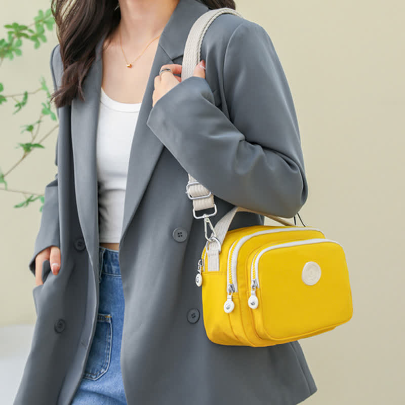 Kleine Handtasche mit dreifachem Reißverschluss für Damen, leichte, wasserdichte Umhängetasche
