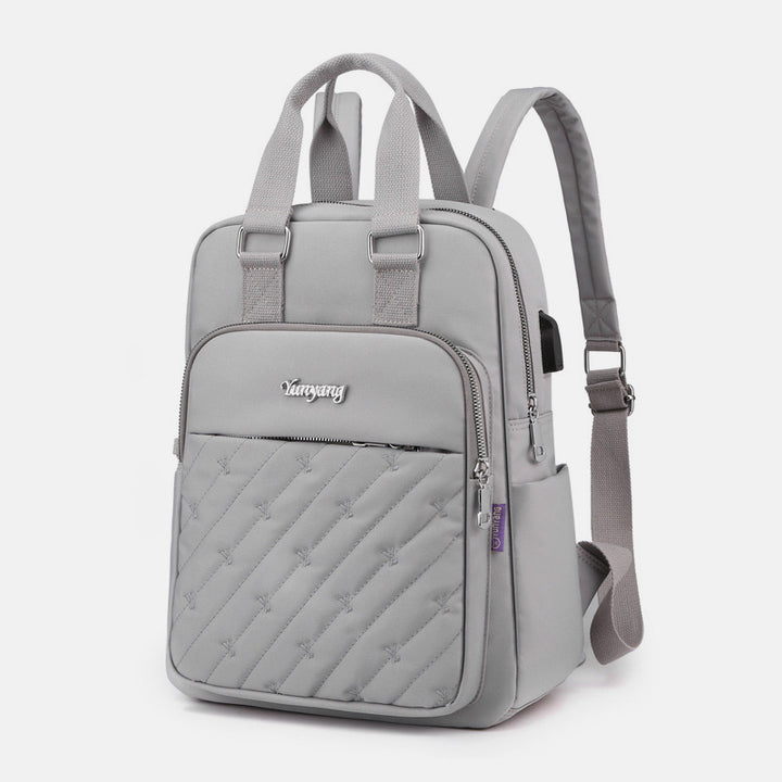 Leichter Rucksack mit Prägestickerei und USB-Ladeanschluss