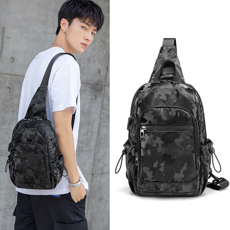 Kleine schwarze Sling-Umhängetasche für Damen und Herren, Tagesrucksack mit USB-Ladegerät
