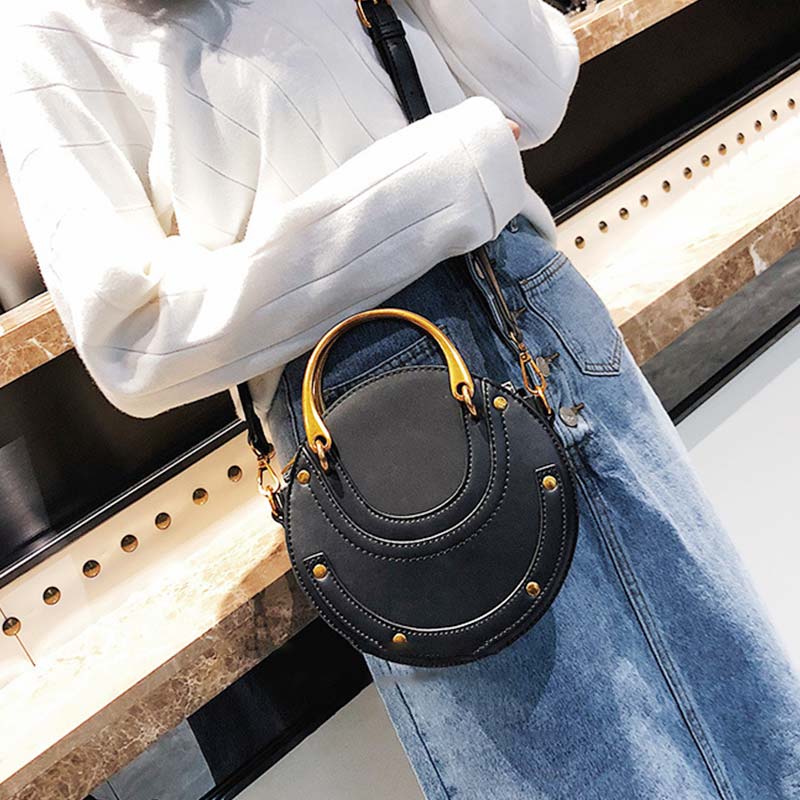 Elegante, runde Top-Grifftasche mit großem Fassungsvermögen und metallischem Griff