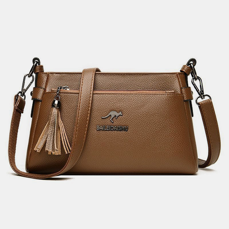 Umhängetasche aus echtem Leder für Damen, kleine Umhängetasche mit Quaste - Sienna - image 25