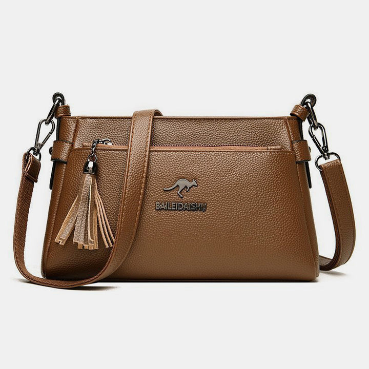 Umhängetasche aus echtem Leder für Damen, kleine Umhängetasche mit Quaste - Sienna - image 25